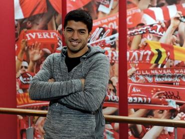 Smiling assassin: Suarez to lead Liverpool to cup glory  